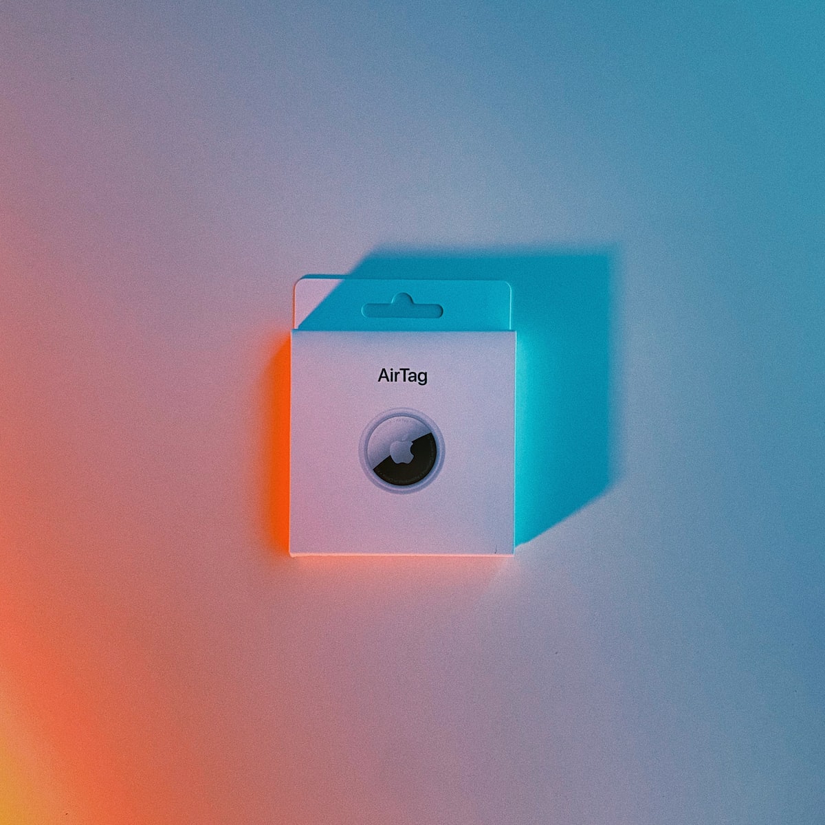 pink and white speaker on pink surface